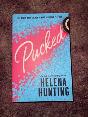 Pucked by Helena Hunting - Pink & Light Blue Paperback